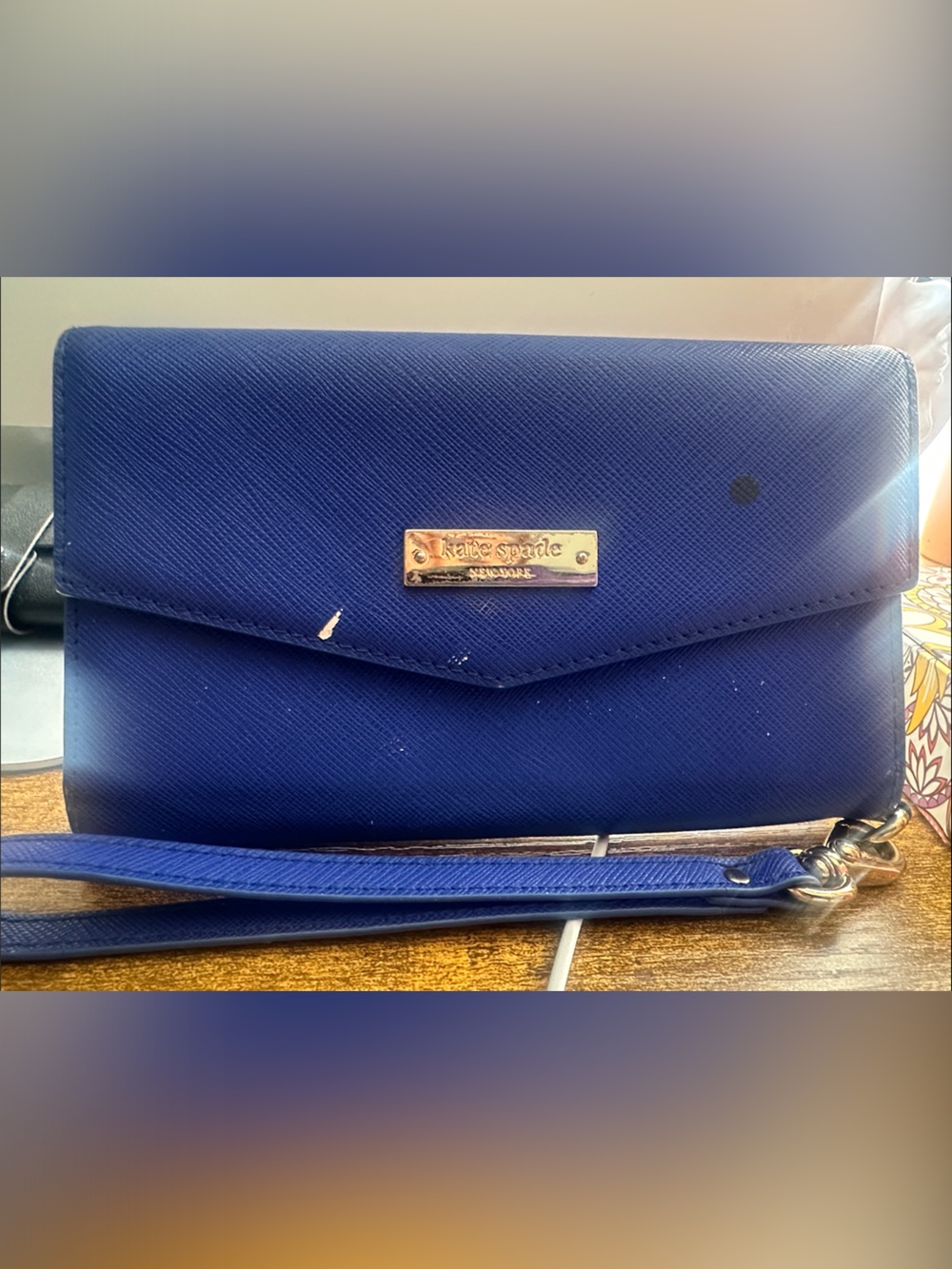 kate spade navy saffiano wristlet with gold plaque